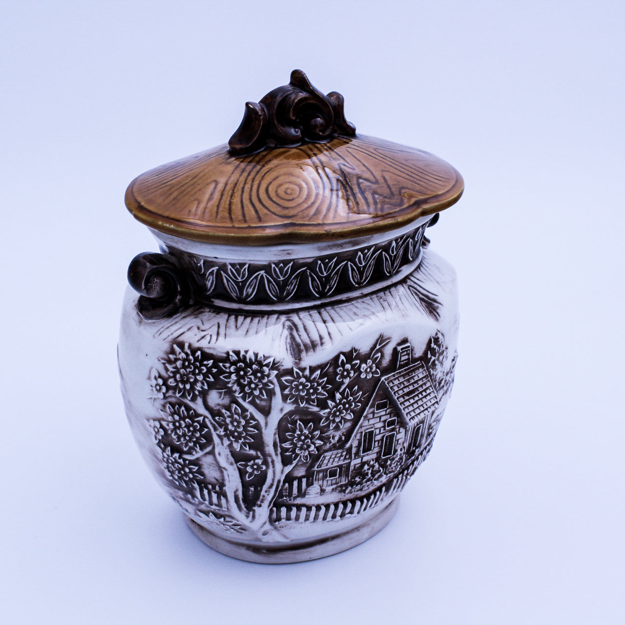 Cream Ceramic Cookie Jar – Raised Cottage Scene, Brown Glaze Accents