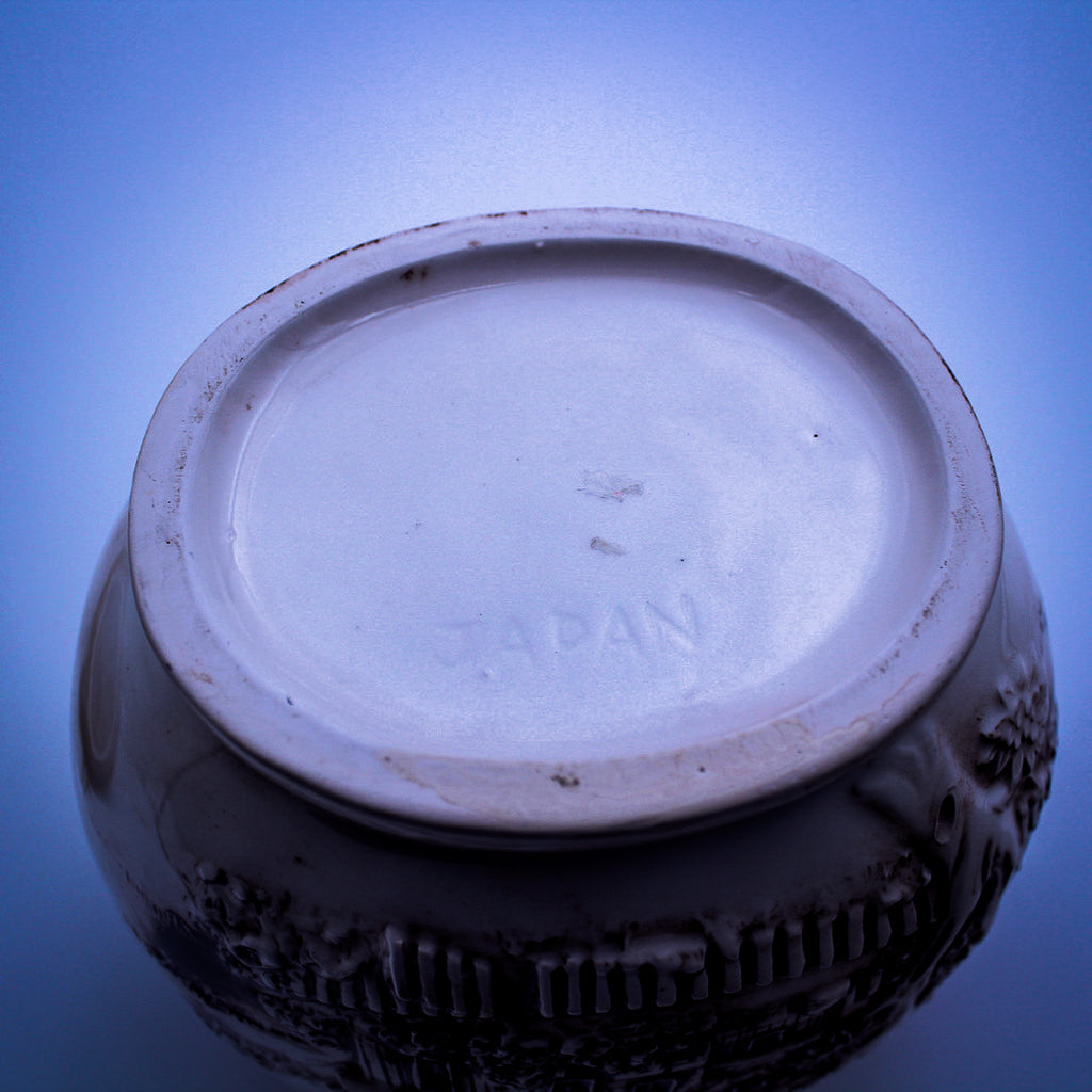 Cream Ceramic Cookie Jar – Raised Cottage Scene, Brown Glaze Accents