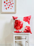 Throw Pillow: Red Carnations on Snow