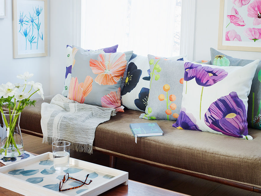 Throw Pillow: Purple Poppies on Snow