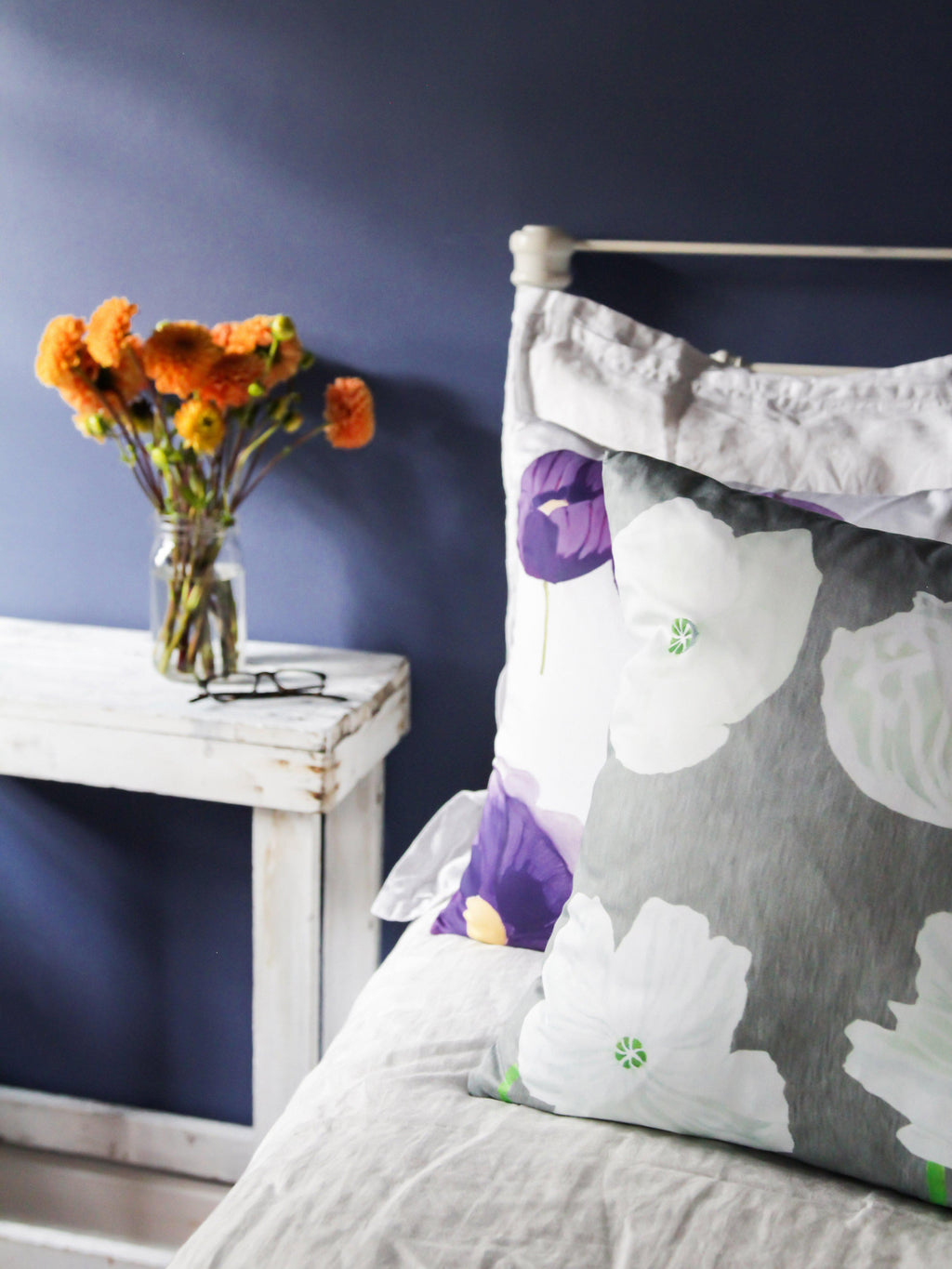 Throw Pillow: Purple Poppies on Snow